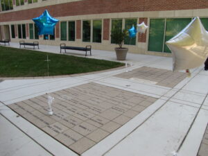 Brick pavers with balloons on them